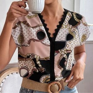 Geo & Caín print lace trim blouse